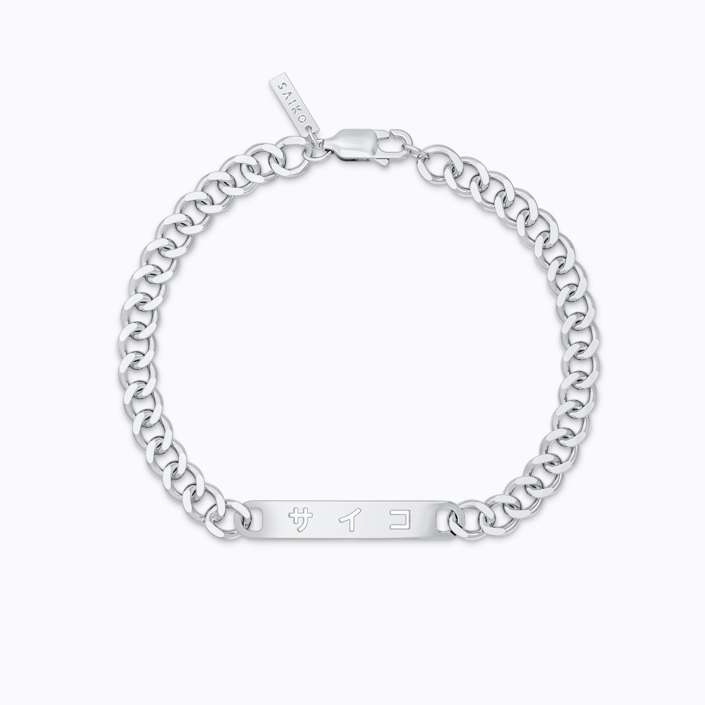 Silver stainless steel 316L cuban chain bracelet with Japanese SAIKO logo cut through the pendant placed on the ground with a white background