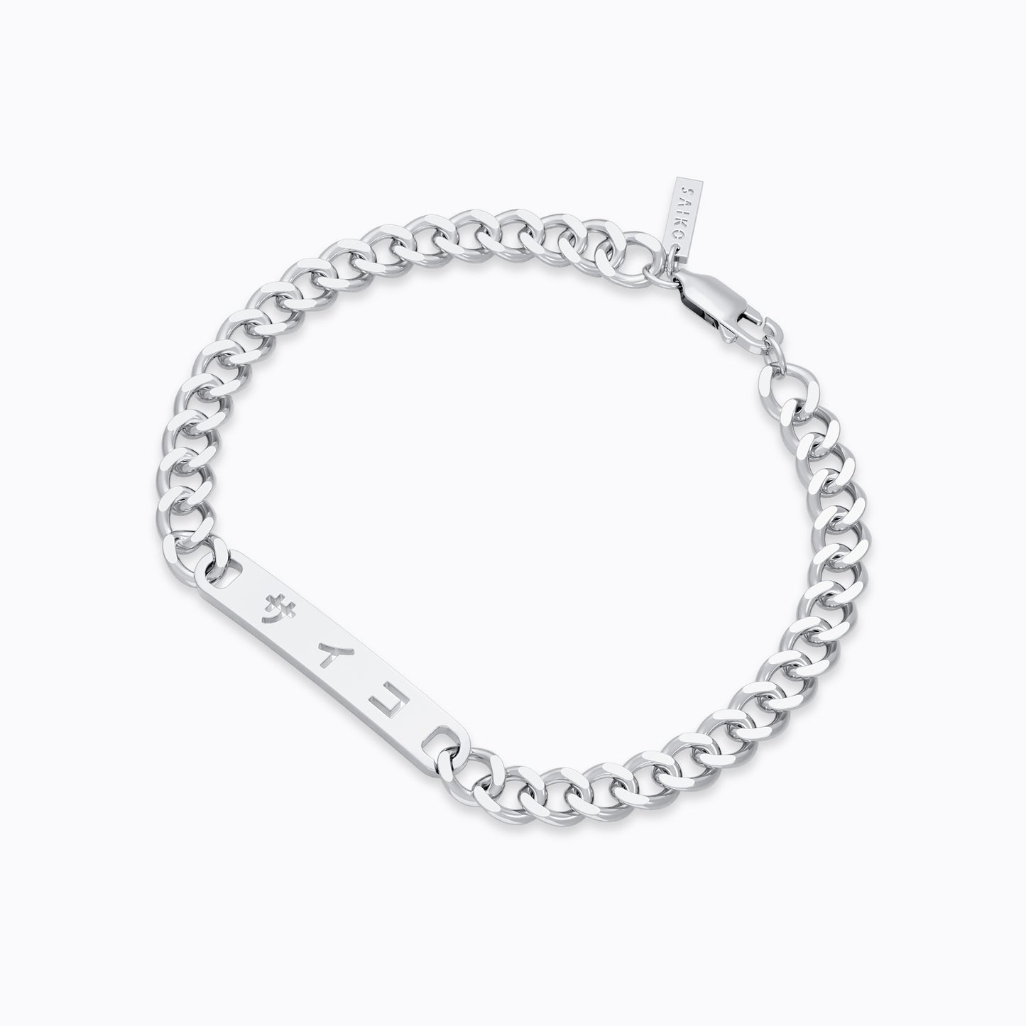 Silver stainless steel 316L cuban chain bracelet with Japanese SAIKO logo cut through the pendant placed on the ground with a white background