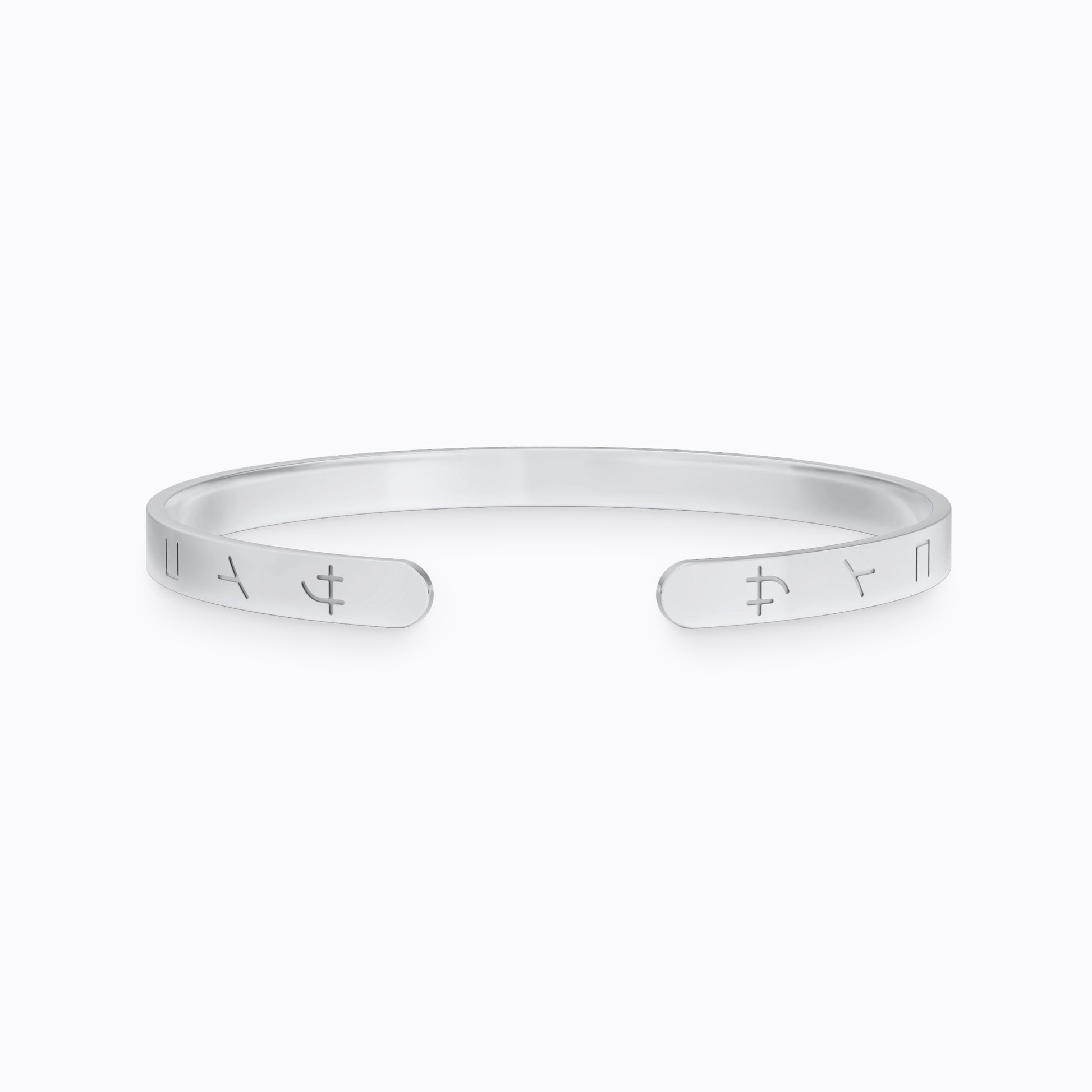 Silver stainless steel 316L cuff bracelet bangle with Japanese SAIKO logo engraved placed on the ground with a white background