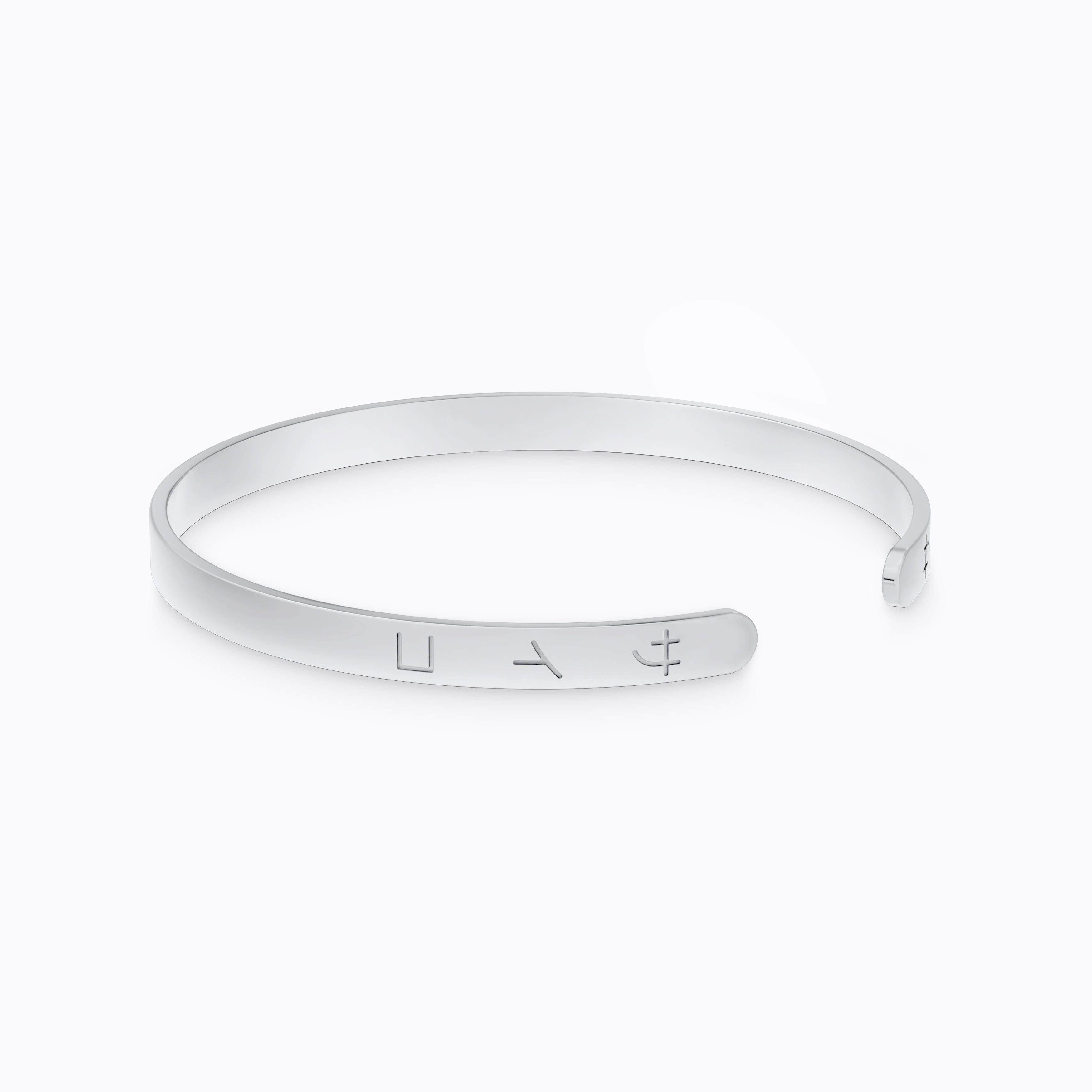 Silver stainless steel 316L cuff bracelet bangle with Japanese SAIKO logo engraved placed on the ground with a white background